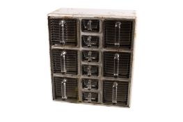 A mid-century pine and glass spice cabinet.