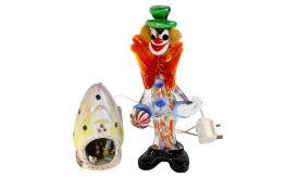 A Murano glass clown and a Derek Fowler studio/Peggy Foy ceramic 'Mushroom House' night light.