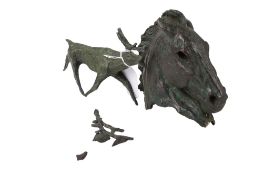 A bronze model of a deer and a sculpture of a horse's head. The deer engraved 'AA', L16.