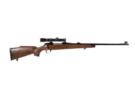 BSA 243 bolt action rifle with scope. S/n 11R6255 with a three shot magazine and scope.
