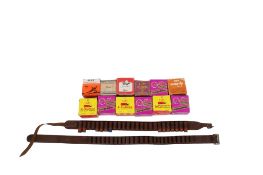 An amount of assorted shotgun cartridges and two leather belts. 12 and 20 gauge, boxed.
