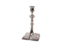An Edwardian weighted silver candlestick.
