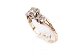 An 18ct gold (tested) and diamond ring. Set with five mixed round cut diamonds of 0.