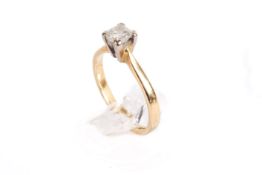 A hallmarked 18ct gold diamond solitaire ring. Set with one princess cut diamond of 0.