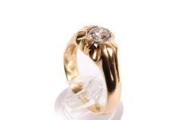 An 18ct gold (tested) single stone diamond ring. Set with one old brilliant cut diamond of 0.