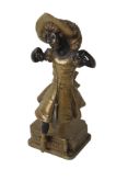 An early 20th century Venetian cold painted bronze model of the 'Cake Walk' by Carl Kauba.