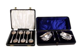 A pair of early 20th century silver salts and a set of six teaspoons.