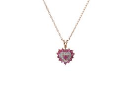 A 9ct gold and ruby heart pendant and chain.