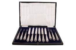 An Art Deco set of silver handled fruit cutlery.
