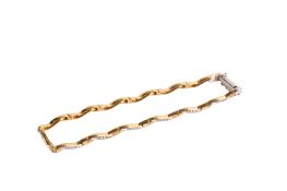 An 18ct gold (tested) twist motif bracelet set with round faceted cubic zirconia.