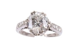 A white metal and diamond ring.