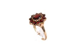 A 9ct gold garnet cluster ring.