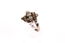 A Georgian 9ct gold (tested) and diamond dress ring.