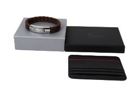 A Jaguar F Type card holder and a Under The Rose bracelet.