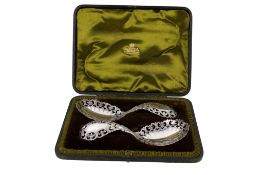 A Victorian pair of pierced silver bonbonniere spoons.
