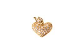 An 18ct gold (tested) heart shaped pendant. Set with round faceted cubic zirconia.