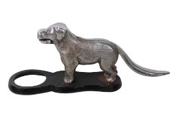 A vintage cast metal nutcracker.