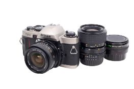 A Nikon FE10 35mm SLR camera outfit. Serial number 2034053.