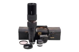 A Tamron 200-500mm f6.9 telephoto lens and Canon Extender FD 2x-A.