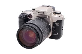 A Canon EOS 50E Eye Control 35mm SLR camera. Untested. With a Sigma Zoom 28-200mm f3.8-5.