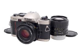 A Nikon FE10 35mm SLR camera outfit. Serial number 2015688.