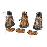Three vintage Doctor Who radio controlled Dalek models.