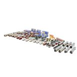 An assortment of Hornby Dublo 00 gauge rolling stock, carriages and buildings.