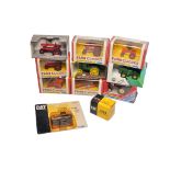 A quantity of Ertl diecast farm model issues in 1/32, 1/43 and 1/64. Both tractor and implements, as