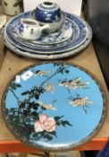 A 19th Century Delft charger with floral decoration 35 cm diameter together with a further Delft