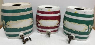 Three late 19th/early 20th Century glazed pottery spirit barrels of oval form, all unnamed,