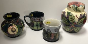 A collection of modern Moorcroft pottery including a Simeon pattern ginger jar and cover 15 cm high,