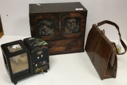 A 19th Century Japanese parquetry work table top chest with two mother of pearl inlaid panelled