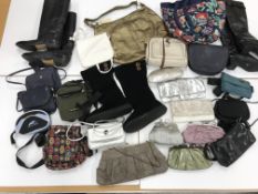 Two boxes containing three pairs of boot