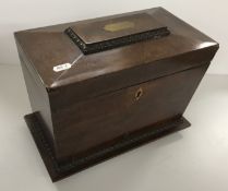 A 19th Century mahogany tea caddy of sar
