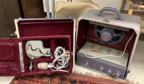 A vintage Elmo projector with Elmo Sound box and Elmo model S-8PM speaker