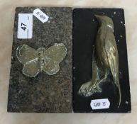 A Victorian black marble paperweight decorated with a bronze figure of a dead bird, 15 cm x 7.