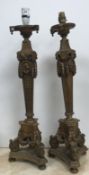 A pair of carved giltwood table lamps in the Baroque manner, with all-over wheat ear, medallion,