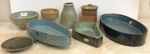 A collection of studio pottery wares to include a George H Wilson mottled green glazed pottery dish,