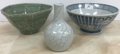 A Japanese blue and white and mottled glazed bowl with blue undergazed signature mark,