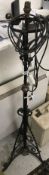 A telescopic wrought iron and copper sta