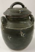 A Winchcombe Pottery glazed jar and cove