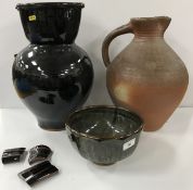 A studio pottery mottled green glazed bo