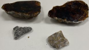 Two raw amber sections, polished to one