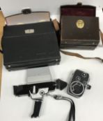 A Paillard Bolex C8 cine camera with lea