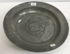 A 19th Century pewter dish, decorated wi