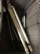 A box containing five assorted camera tr