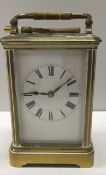 A 19th Century French carriage clock by Henri Jacot, the white enamel dial with Roman numerals,