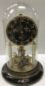 WITHDRAWN An early to mid 20th Century 365 day mantel clock by Kan,