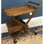 A mid 20th Century teak two tier bar car