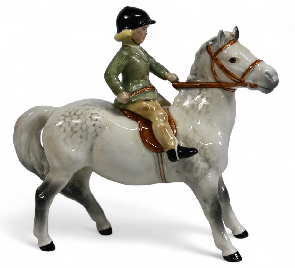 Beswick Girl on light dapple grey Pony Model 1499, wearing a Green Jacket, no visible damage or